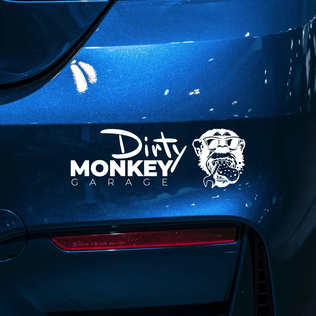 Logo autoservisu Dirty Monkey Garage